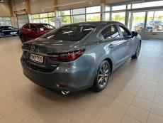 Sedan 2,0 (165) SKYACTIV-G Vision Business 6AT 4ov YQ1B