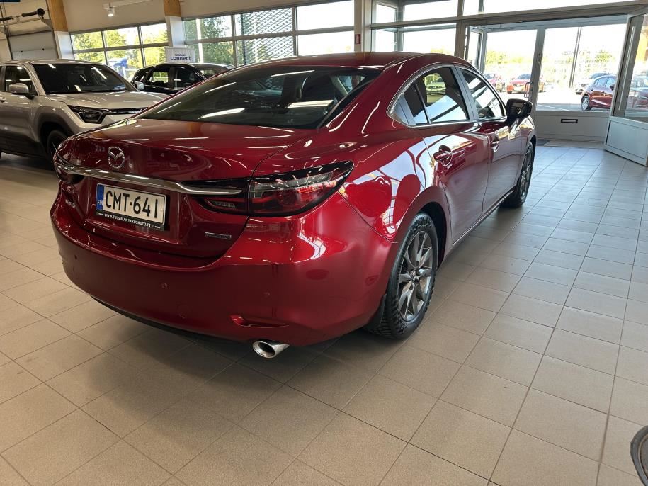 Sedan 2,0 (165) SKYACTIV-G Vision 6AT 4ov YQ1