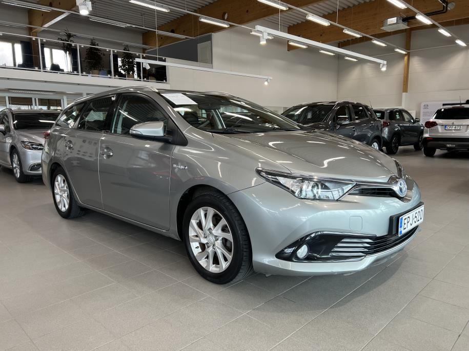 Touring Sports 1,8 Hybrid Active