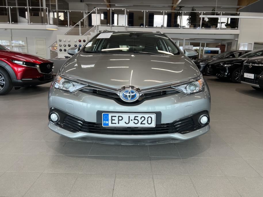 Touring Sports 1,8 Hybrid Active