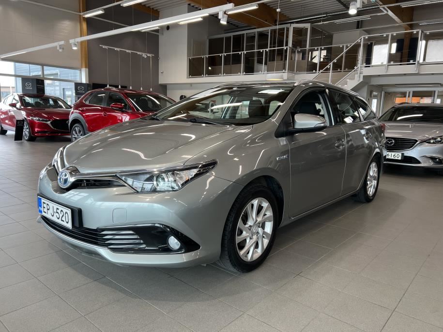 Touring Sports 1,8 Hybrid Active