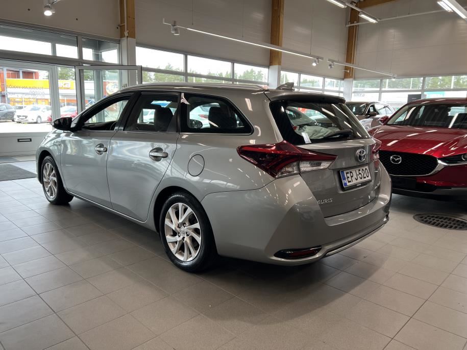 Touring Sports 1,8 Hybrid Active