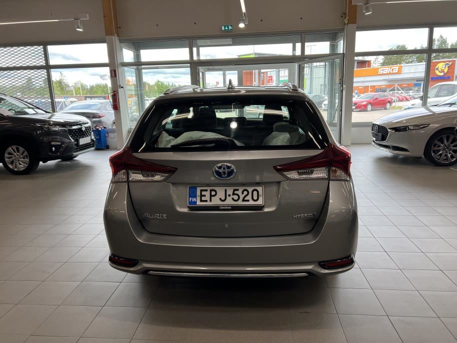 Touring Sports 1,8 Hybrid Active