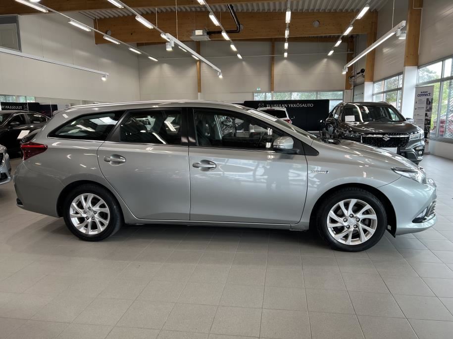 Touring Sports 1,8 Hybrid Active