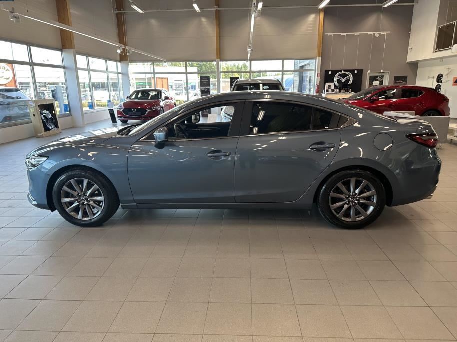 Sedan 2,0 (165) SKYACTIV-G Vision Business 6AT 4ov YQ1B