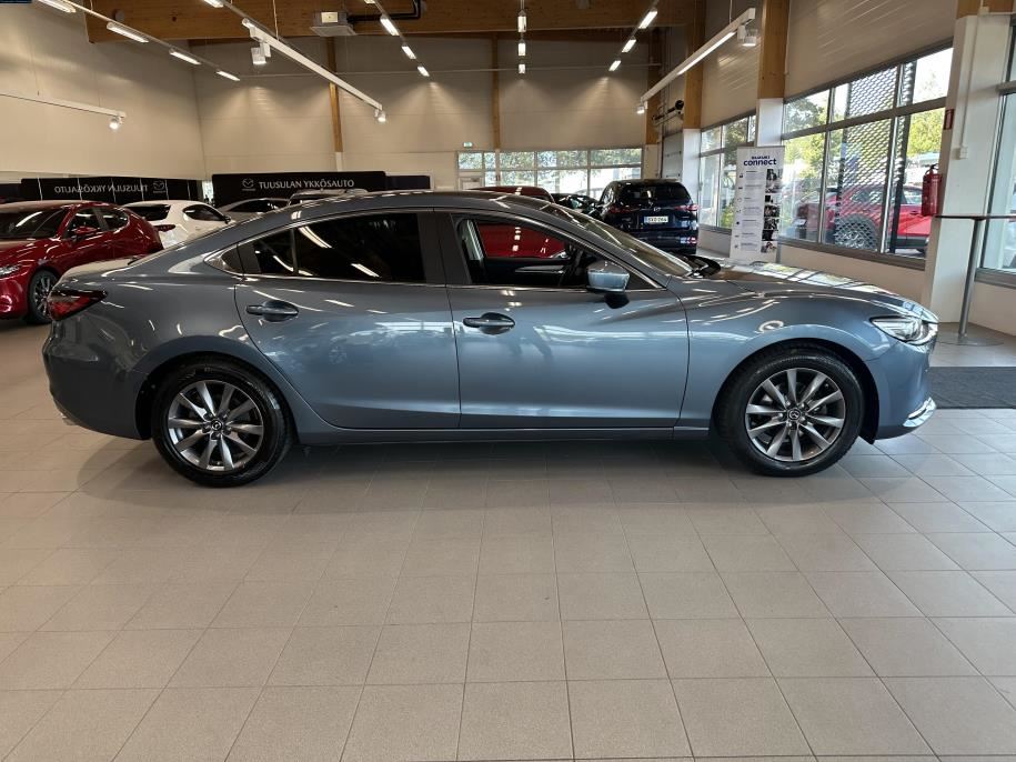 Sedan 2,0 (165) SKYACTIV-G Vision Business 6AT 4ov YQ1B